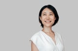 Smiling eastern middle age female entrepreneur ceo leader businesswoman